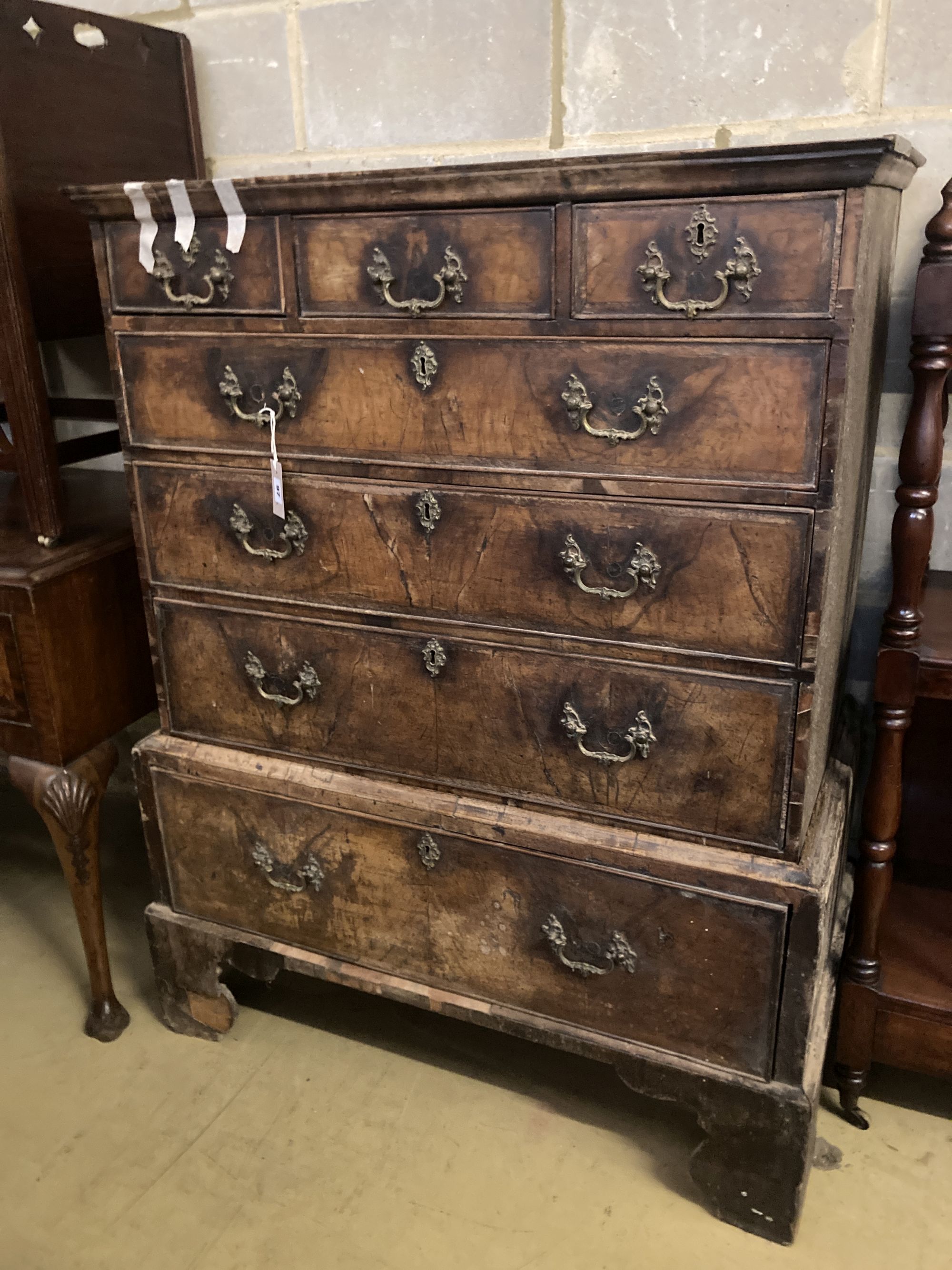 A Queen Anne walnut chest on stand, width 100cm depth 53cm height 131cm